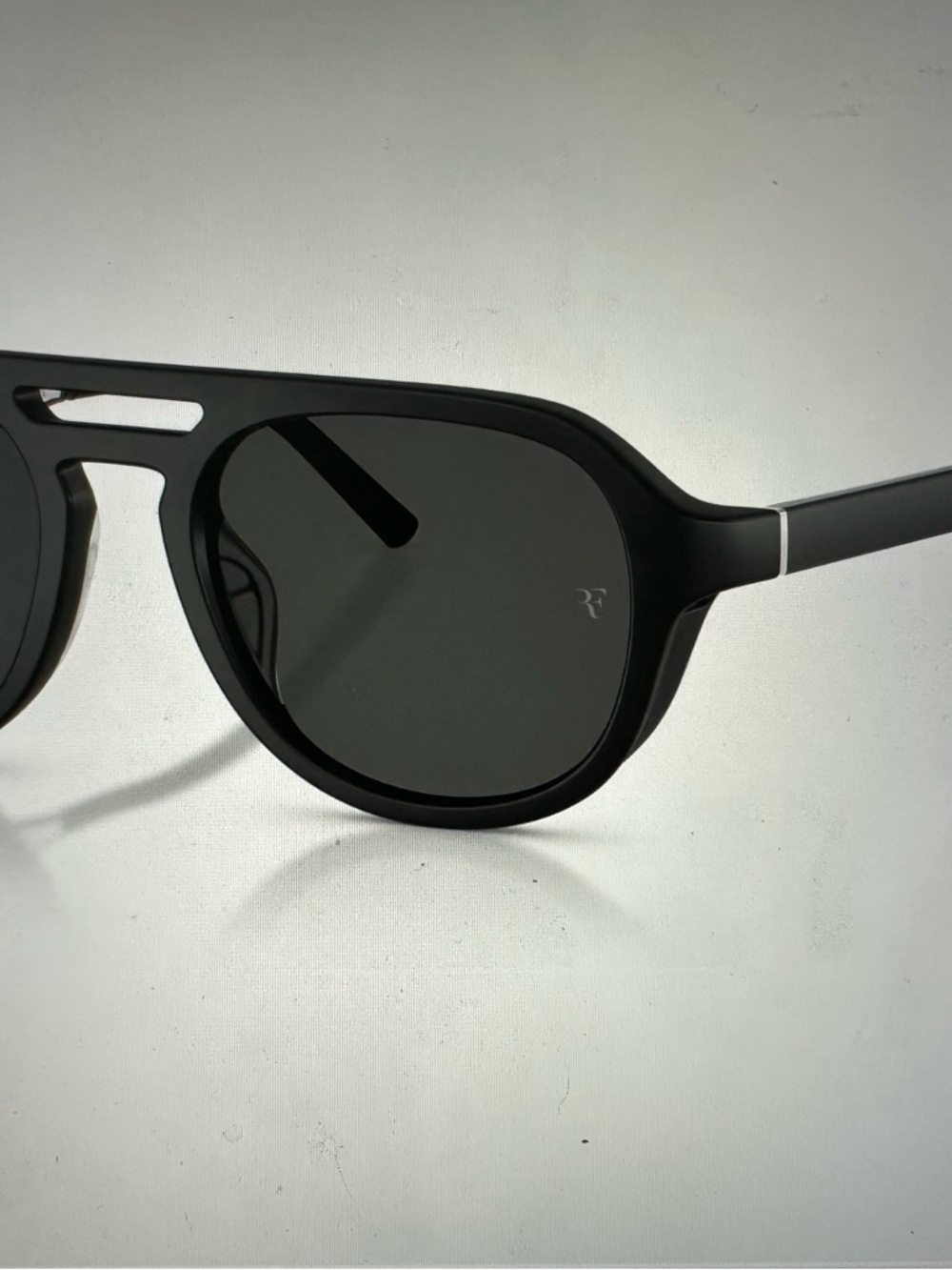 Oliver Peoples Black Sunglasses with Dark Lenses